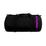 "be human" Duffle Bag (pink and black all over graphic)