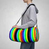 rainbow candy stripe duffle bag with stay curious, be wonderful. in pink.
