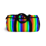 rainbow candy stripe duffle bag with stay curious, be wonderful. in pink.