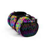 CMYK woof! duffle bag on black background.