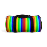 rainbow candy stripe duffle bag with stay curious, be wonderful. in pink.