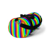 rainbow candy stripe duffle bag with stay curious, be wonderful. in pink.