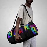 "destination bear" Duffle Bag (radial rainbow graphic)
