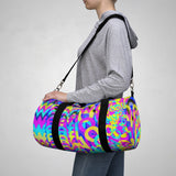 Copy of CMYK woof! duffle bag on blue background.