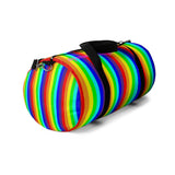 rainbow candy stripe duffle bag with stay curious, be wonderful. in pink.