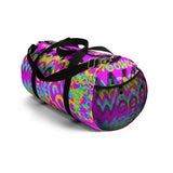 CMYK woof! duffle bag on bright magenta back ground.