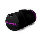 "be human" Duffle Bag (pink and black all over graphic)