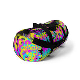 CMYK woof! duffle bag on black background.