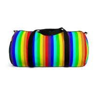 rainbow candy stripe duffle bag with stay curious, be wonderful. in pink.
