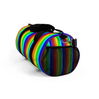rainbow candy stripe duffle bag with stay curious, be wonderful. in pink.